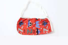 HI MEDIC ARM SLING KIDS (L) حامل حجم باللون الأبيض